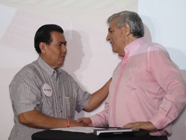 Carlos Alvarado, gerente de Mercacentro y Alejandro Inostroza, gerente de Enertolima