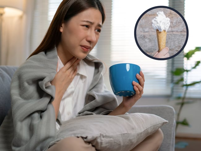 Mujer con dolor de garganta sosteniendo un vaso y a su lado un cono de helado (Getty Images)