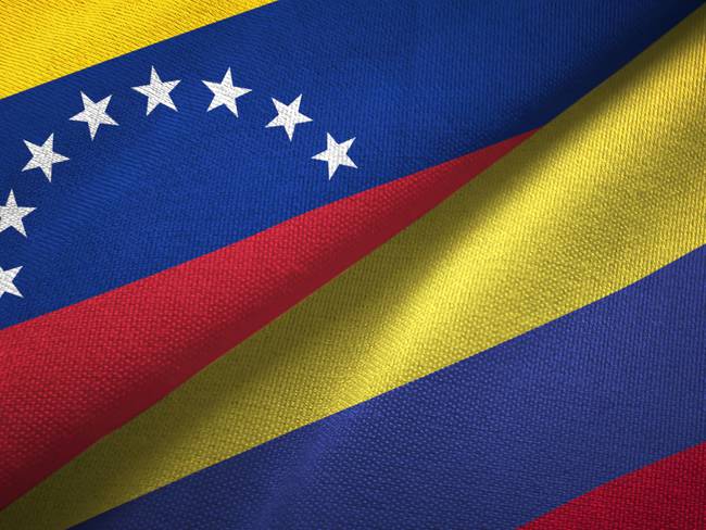Venezuela and Colombia flags together relations textile cloth, fabric texture