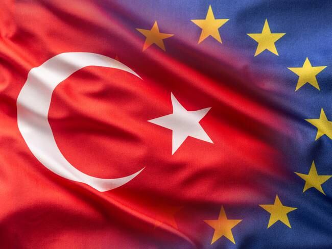Collage of Turkish and European union flags.