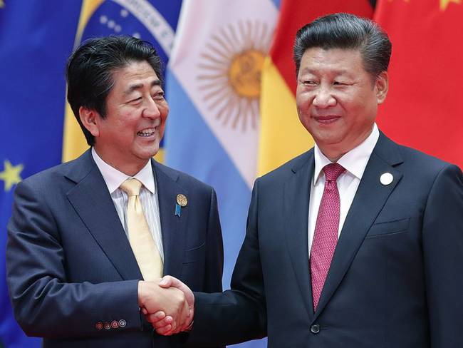 Shinzo Abe y Xi Jinping.