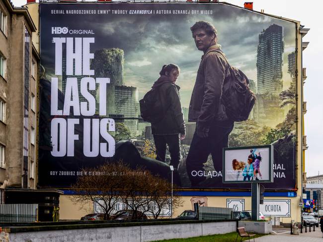 HBO&#039;s &#039;The Last of Us&#039; TV series huge advertising banner is seen in the city center in Warsaw, Poland on January 19, 2023. The show is an American post-apocalyptic drama television series created by Craig Mazin and based on the 2013 video game. (Photo by Beata Zawrzel/NurPhoto via Getty Images)