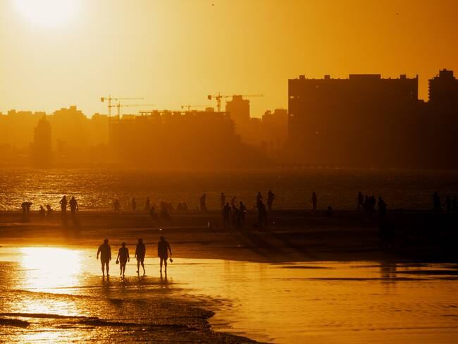 Sun setting over Montevideo city, Malvin beach, Uruguay.Image taken outdoors, daylight, in summer.
