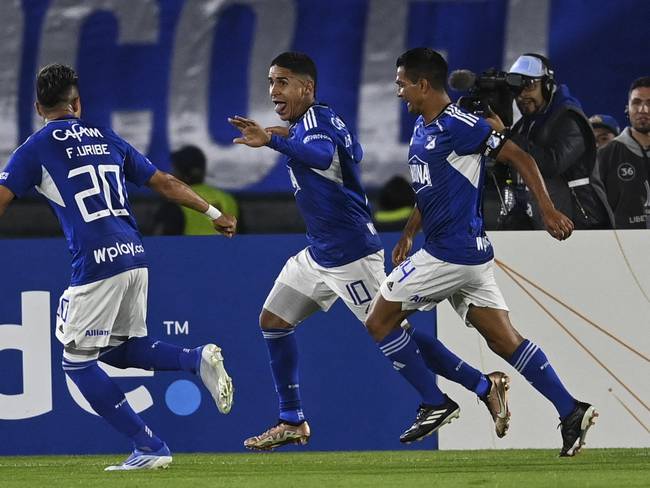 Millonarios&#039; midfielder Daniel Cataño (C) celebrates after scoring against Universidad Catolica during the second leg Copa Libertadores second stage football match between Colombia&#039;s Millonarios and Ecuador&#039;s Universidad Catolica, at the El Campin stadium in Bogota on March 2, 2023. (Photo by Juan BARRETO / AFP) (Photo by JUAN BARRETO/AFP via Getty Images)