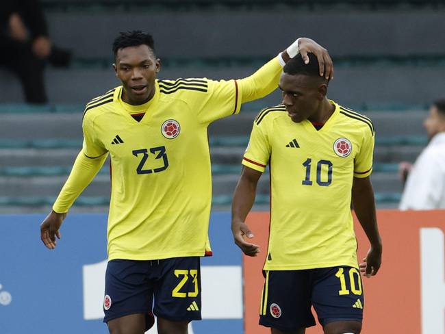 Cabezas y Manyoma, los dos anotadores de los goles de Colombia ante Venezuela. EFE/ Mauricio Dueñas Castañeda