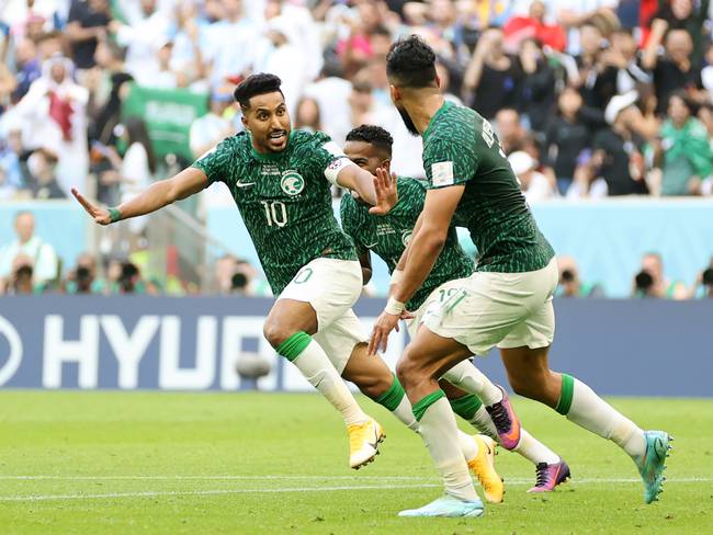 LUSAIL CITY, QATAR - NOVEMBER 22: Salem Al-Dawsari of Saudi Arabia celebrates after scoring their team&#039;s second goal during the FIFA World Cup Qatar 2022 Group C match between Argentina and Saudi Arabia at Lusail Stadium on November 22, 2022 in Lusail City, Qatar. (Photo by Clive Brunskill/Getty Images)