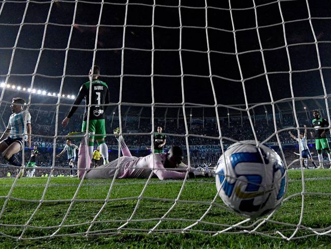 Atletico Nacional&#039;s defender Felipe Aguirre (2-L) scores an own goal during the Copa Libertadores round of 16 second leg football match between Argentina&#039;s Racing Club and Colombia&#039;s Atletico Nacional, at the Presidente Juan Domingo Peron (El Cilindro) stadium, in Buenos Aires, on August 10, 2023. (Photo by Luis ROBAYO / AFP) (Photo by LUIS ROBAYO/AFP via Getty Images)