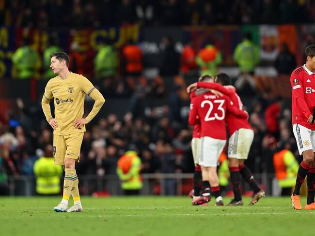 MANCHESTER, ENGLAND - FEBRUARY 23: A dejected Robert Lewandowski of FC Barcelona at full time during the UEFA Europa League knockout round play-off leg two match between Manchester United and FC Barcelona at Old Trafford on February 23, 2023 in Manchester, United Kingdom. (Photo by Robbie Jay Barratt - AMA/Getty Images)
