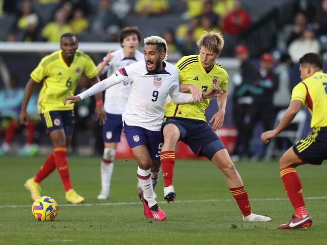 CARSON, CA - JANUARY 28:  Jesús Ferreira #9 of United States and Andrés Llinás #3 of Colombia battle for the ball during the international friendly match between United States and Colombia at Dignity Health Sports Park on January 28, 2023 in Carson, California. (Photo by Omar Vega/Getty Images)