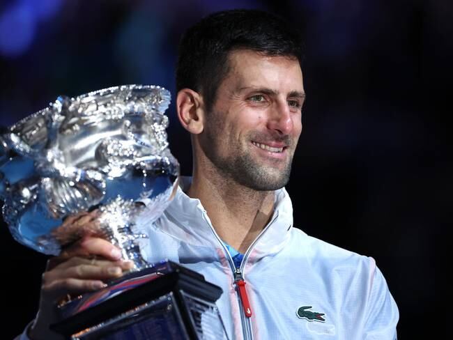 MELBOURNE, AUSTRALIA - JANUARY 29: Novak Djokovic of Serbia poses with the Norman Brookes Challenge Cup after winning the Men&#039;s Singles Final match against Stefanos Tsitsipas of Greece during day 14 of the 2023 Australian Open at Melbourne Park on January 29, 2023 in Melbourne, Australia. (Photo by Cameron Spencer/Getty Images)