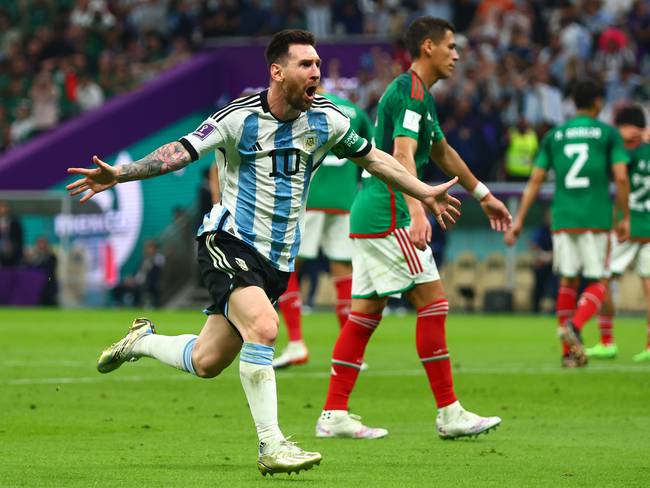 LUSAIL CITY, QATAR - NOVEMBER 26:   Lionel Messi of Argentina celebrates scoring the opening goal  during the FIFA World Cup Qatar 2022 Group C match between Argentina and Mexico at Lusail Stadium on November 26, 2022 in Lusail City, Qatar. (Photo by Chris Brunskill/Fantasista/Getty Images)