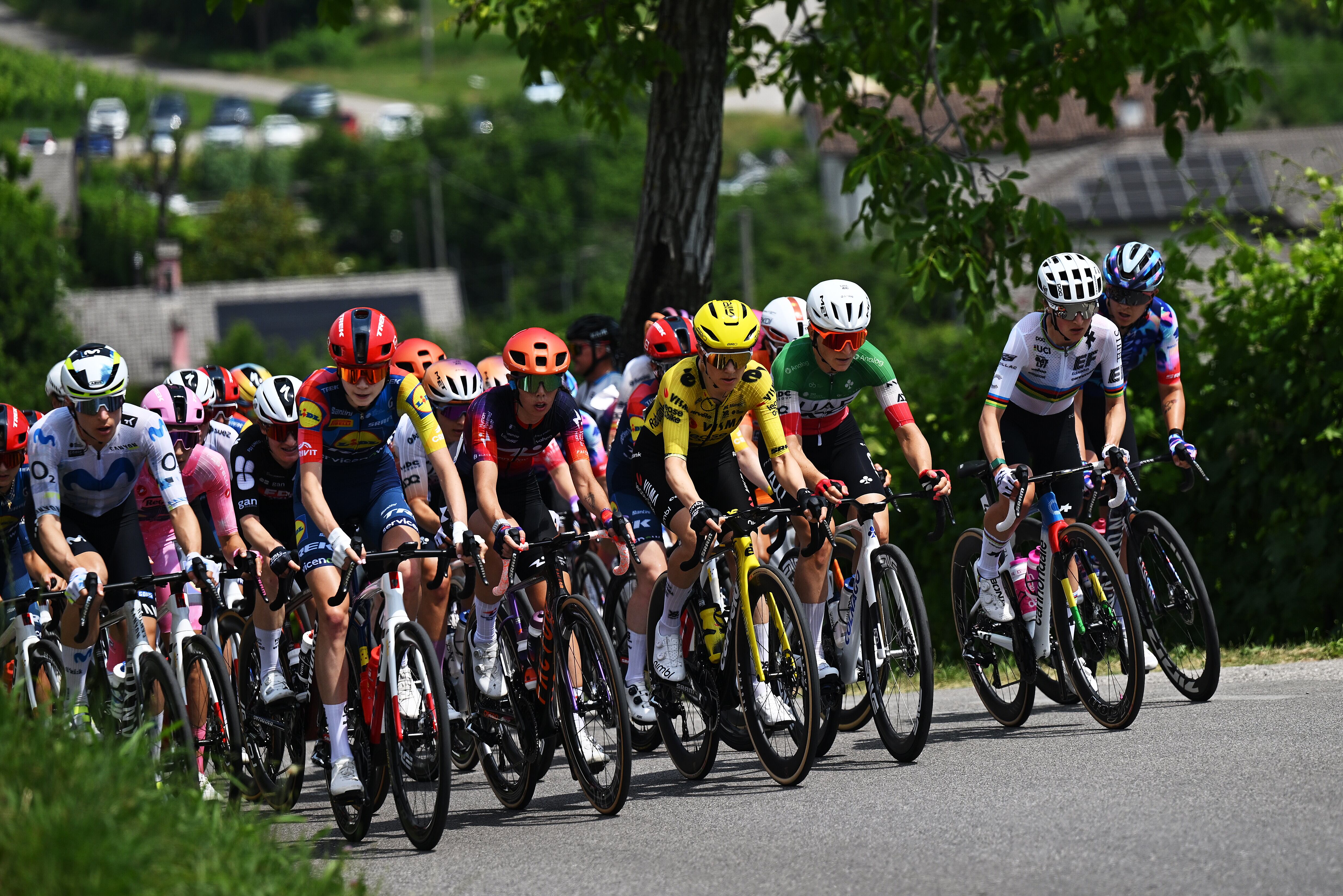 CAORLE, ITALY - MAY 31: (L-R) Marlen Reusser of Switzerland and Team Movistar, Elisa Balsamo of Italy and Team Lidl - Trek - Pink Leader Jersey, Isabella Holmgren of Canada and Team Lidl - Trek, Carlotta Cipressi of Italy and Team Human Powered Health, Eleonora Camilla Gasparrini of Italy and UAE Team ADQ, Amanda Spratt of Australia and Team Lidl - Trek, Elisa Longo Borghini of Italy and UAE Team ADQ, Soraya Paladin of Italy and Team CANYON//SRAM zondacrypto, Magdeleine Vallieres of Canada and Team EF Education-Oatly and a general view of the peloton competing during the 37th Giro d'Italia Women 2026, Stage 2 a 156km stage from Roncade to Caorle / #UCIWWT / on May 31, 2026 in Caorle, Italy. (Photo by Luc Claessen/Getty Images)