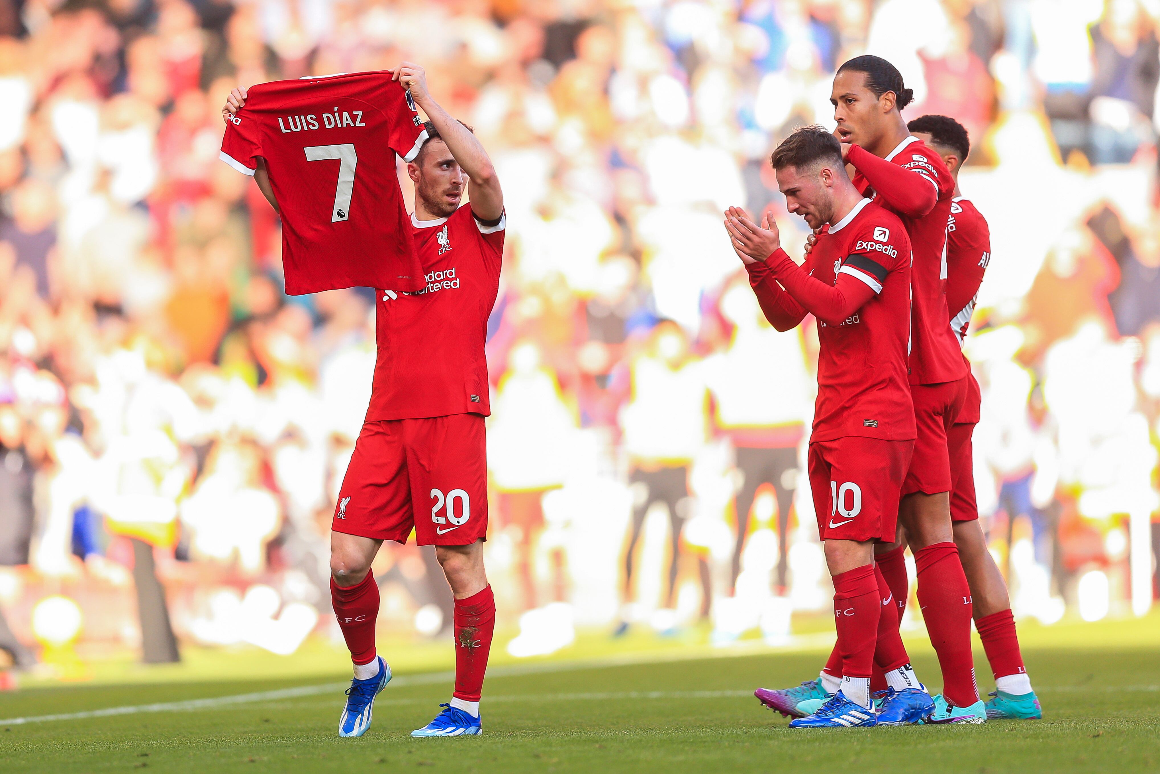 LIVERPOOL, ENGLAND - OCTOBER 29: Diogo Jota of Liverpool holds the shirt of teammate Luis Diaz after scoring their first goal to make the score 1-0 during the Premier League match between Liverpool FC and Nottingham Forest at Anfield on October 29, 2023 in Liverpool, England. (Photo by Daniel Chesterton/Offside/Offside via Getty Images)