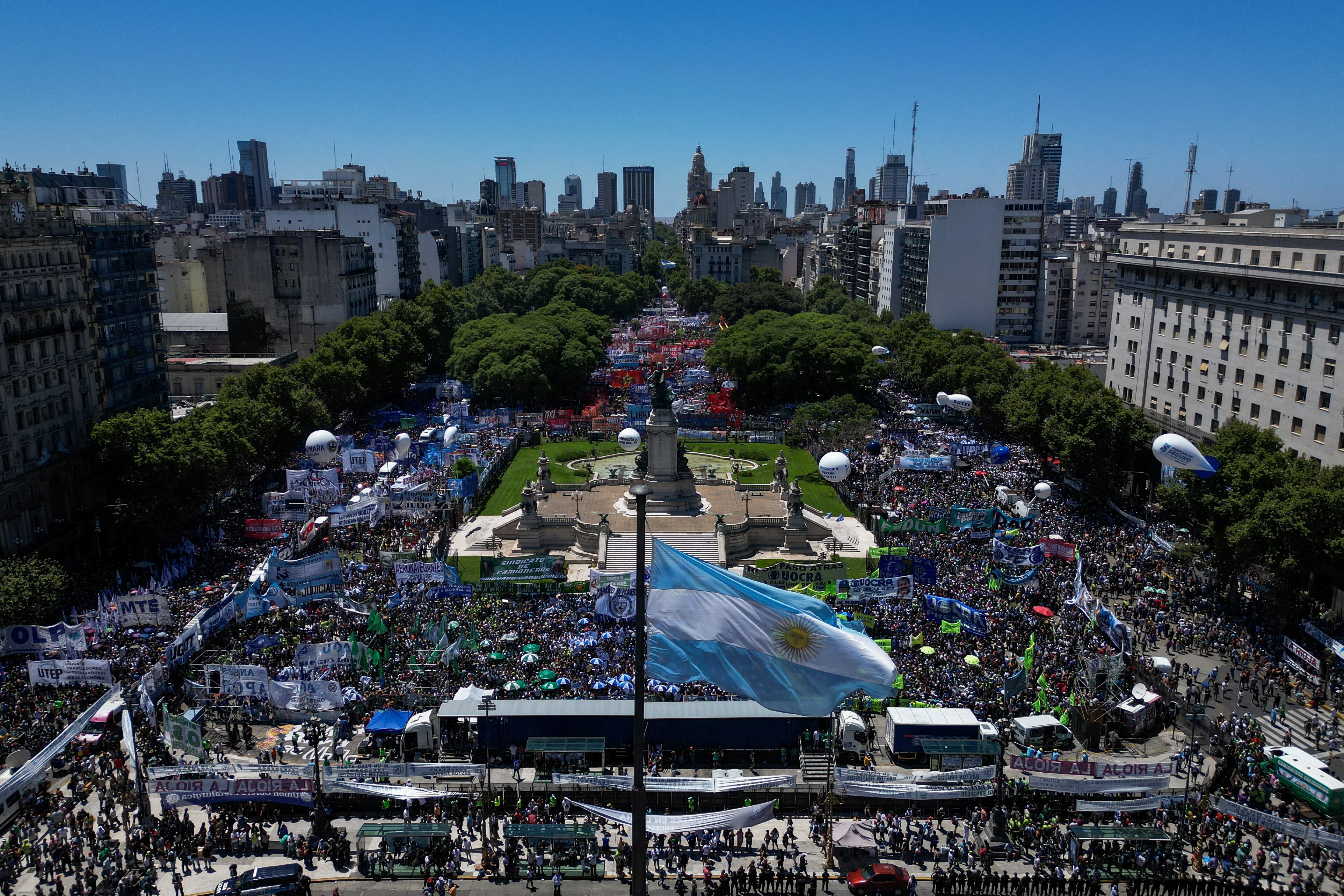 Aerial view of members of unions and social organizations taking part in a demonstration outside the Argentine Congress during a national strike against the government of Javier Milei in downtown Buenos Aires, on January 24, 2024. Argentine President Javier Milei faces the first national strike in just 45 days of government, against his draconian fiscal adjustment and his plan to reform more than a thousand laws and regulations that governed for decades. The largest Argentine union called the strike in rejection, in particular, of the changes by decree to the labor regime promoted by Milei, which limit the right to strike and affect the financing of unions. (Photo by Tomas CUESTA / AFP) (Photo by TOMAS CUESTA/AFP via Getty Images)
