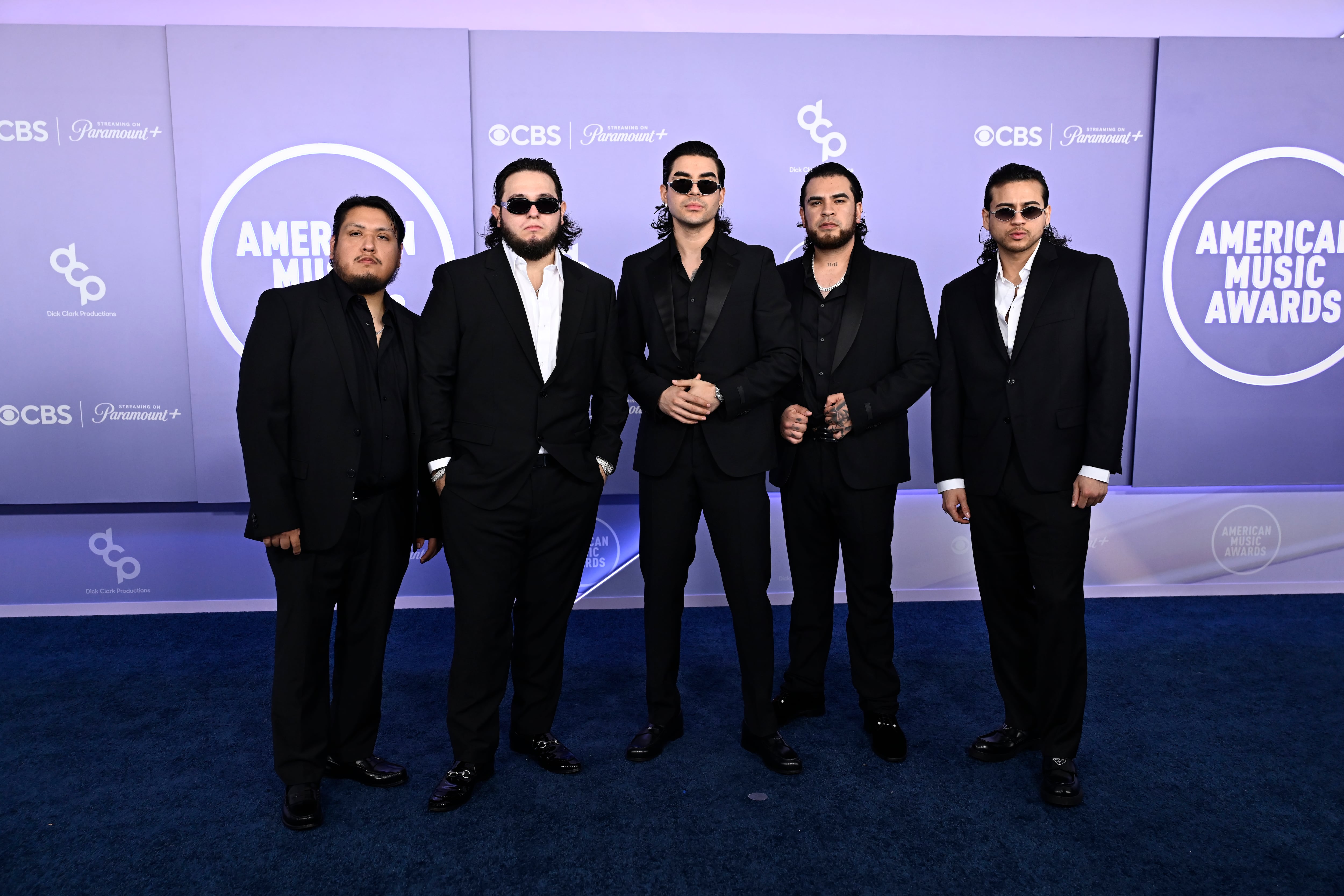 LAS VEGAS, NEVADA - MAY 25: (EDITORIAL USE ONLY) (L-R) Khrystian Ramos, Moisés López, Jesús Ortíz Paz, José Garcia and Samuel Jáimez of Fuerza Regida attend the 52nd American Music Awards at MGM Grand Garden Arena on May 25, 2026 in Las Vegas, Nevada. (Photo by Bryan Steffy/FilmMagic)