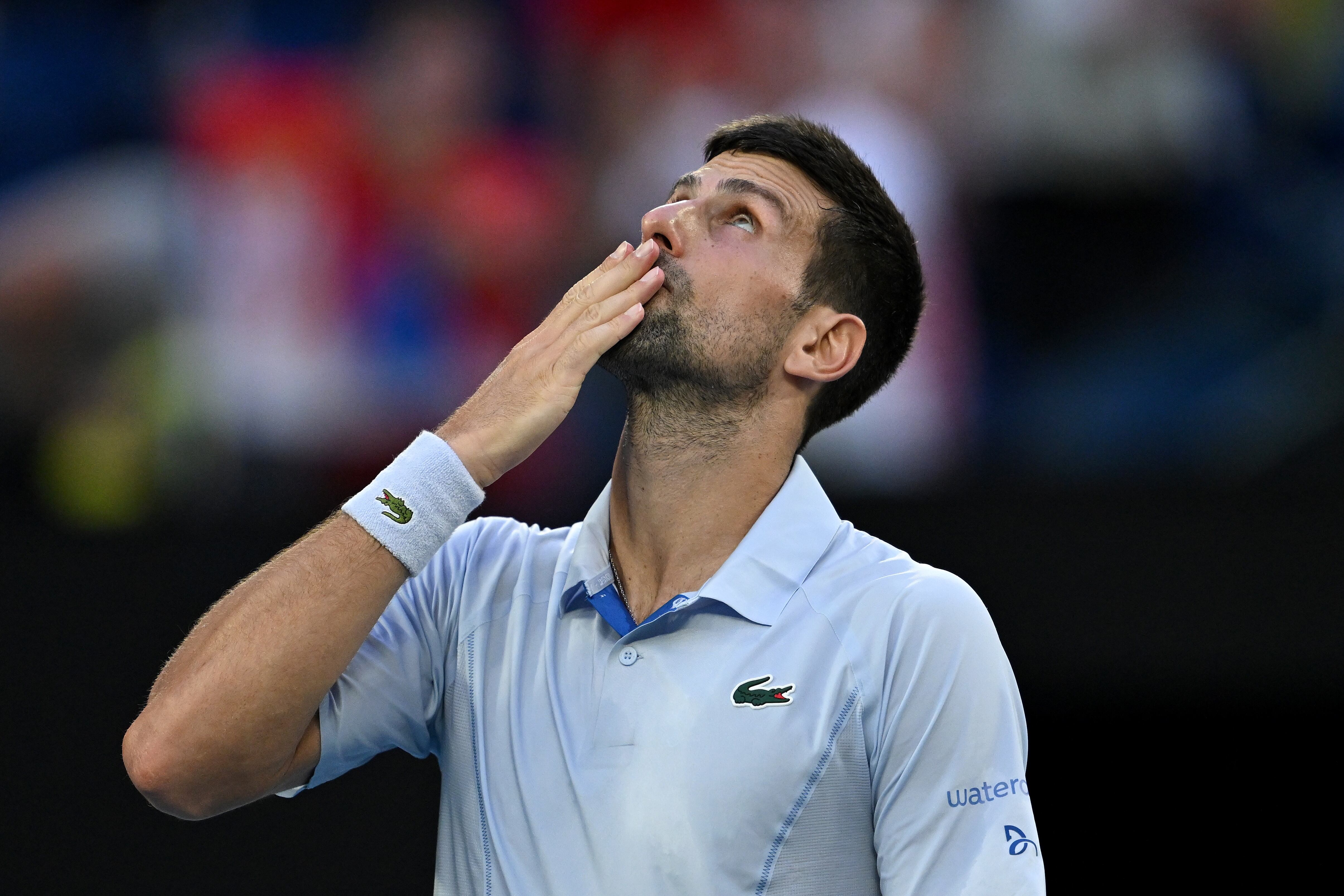 Melbourne (Australia), 23/01/2024.- Novak Djokovic of Serbia celebrates winning his quarterfinal match against Taylor Fritz of USA at the 2024 Australian Open in Melbourne, Australia, 23 January 2024. (Tenis) EFE/EPA/LUKAS COCH AUSTRALIA AND NEW ZEALAND OUT