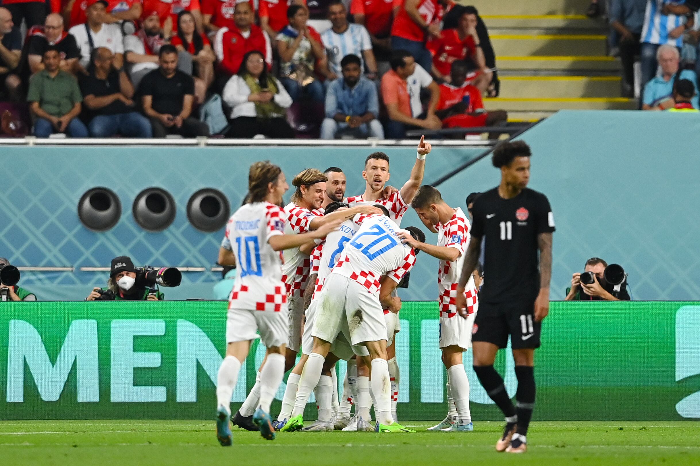 DOHA, QATAR - NOVEMBER 27: Marko Livaja of Croatia celebrates with teammates after scoring their team's second goal during the FIFA World Cup Qatar 2022 Group F match between Croatia and Canada at Khalifa International Stadium on November 27, 2022 in Doha, Qatar. (Photo by Claudio Villa/Getty Images)