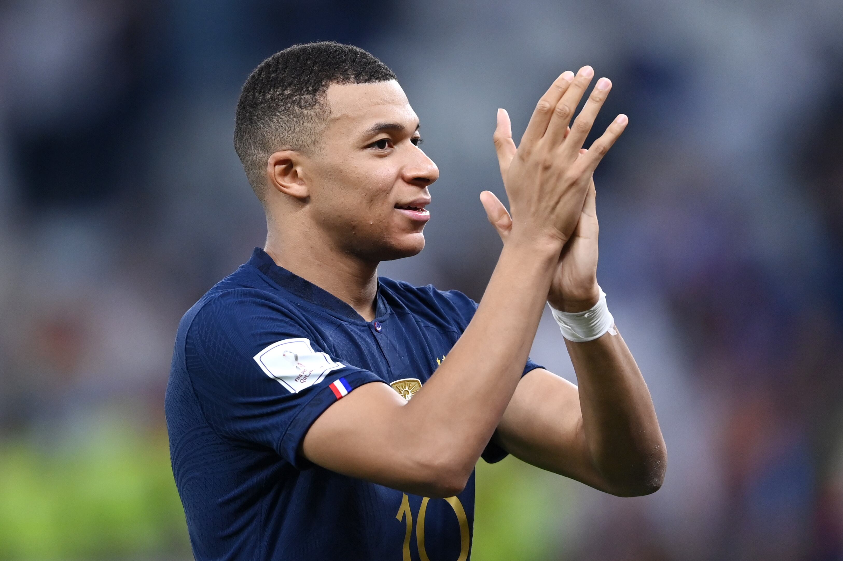 DOHA, QATAR - DECEMBER 04: Kylian Mbappe of France celebrates after the team's victory during the FIFA World Cup Qatar 2022 Round of 16 match between France and Poland at Al Thumama Stadium on December 04, 2022 in Doha, Qatar. (Photo by Laurence Griffiths/Getty Images)