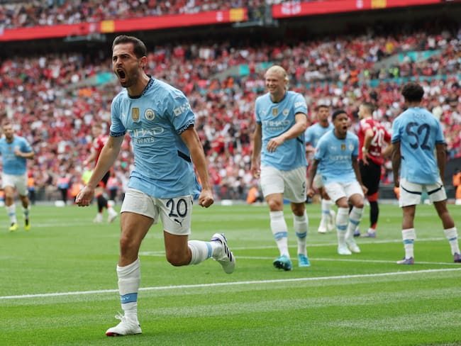Bernardo Silva/ EFE/EPA/ANDY RAIN