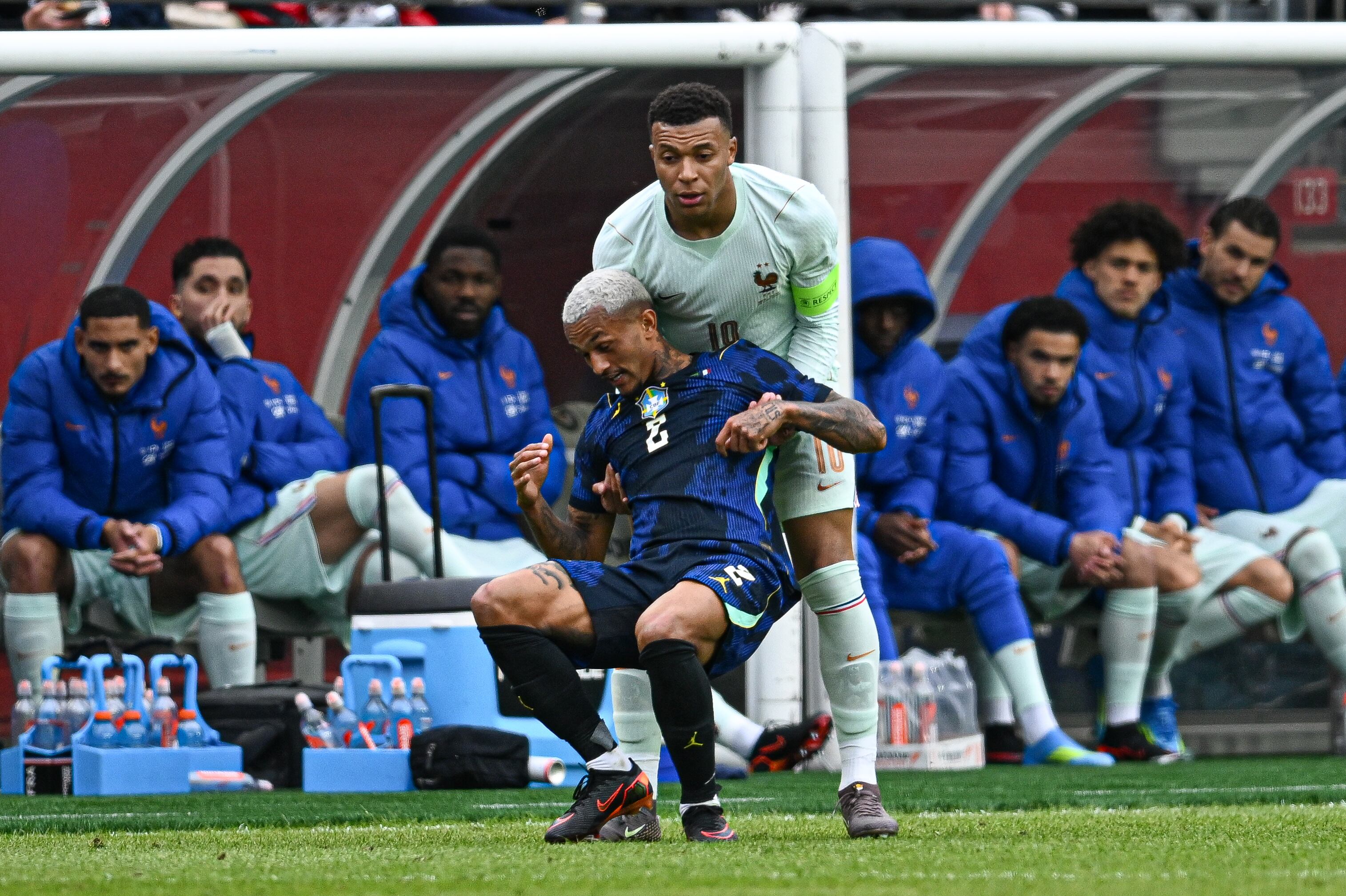 FOXBOROUGH, MASSACHUSETTS - MARCH 26: Kylian Mbappe #10 of France lifts Wesly Franca #2 of Brazil off the ground during the game between France and Brazil at Gillette Stadium on March 26, 2026 in Foxborough, Massachusetts. (Photo by Stephen Nadler/ISI Photos/ISI Photos via Getty Images)