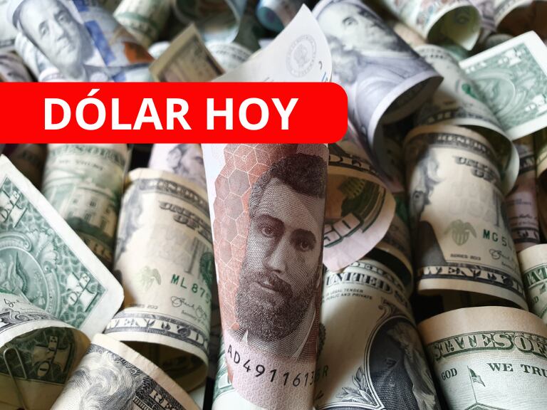 Dólar y billete colombiano, imagen de referencia // GettyImages