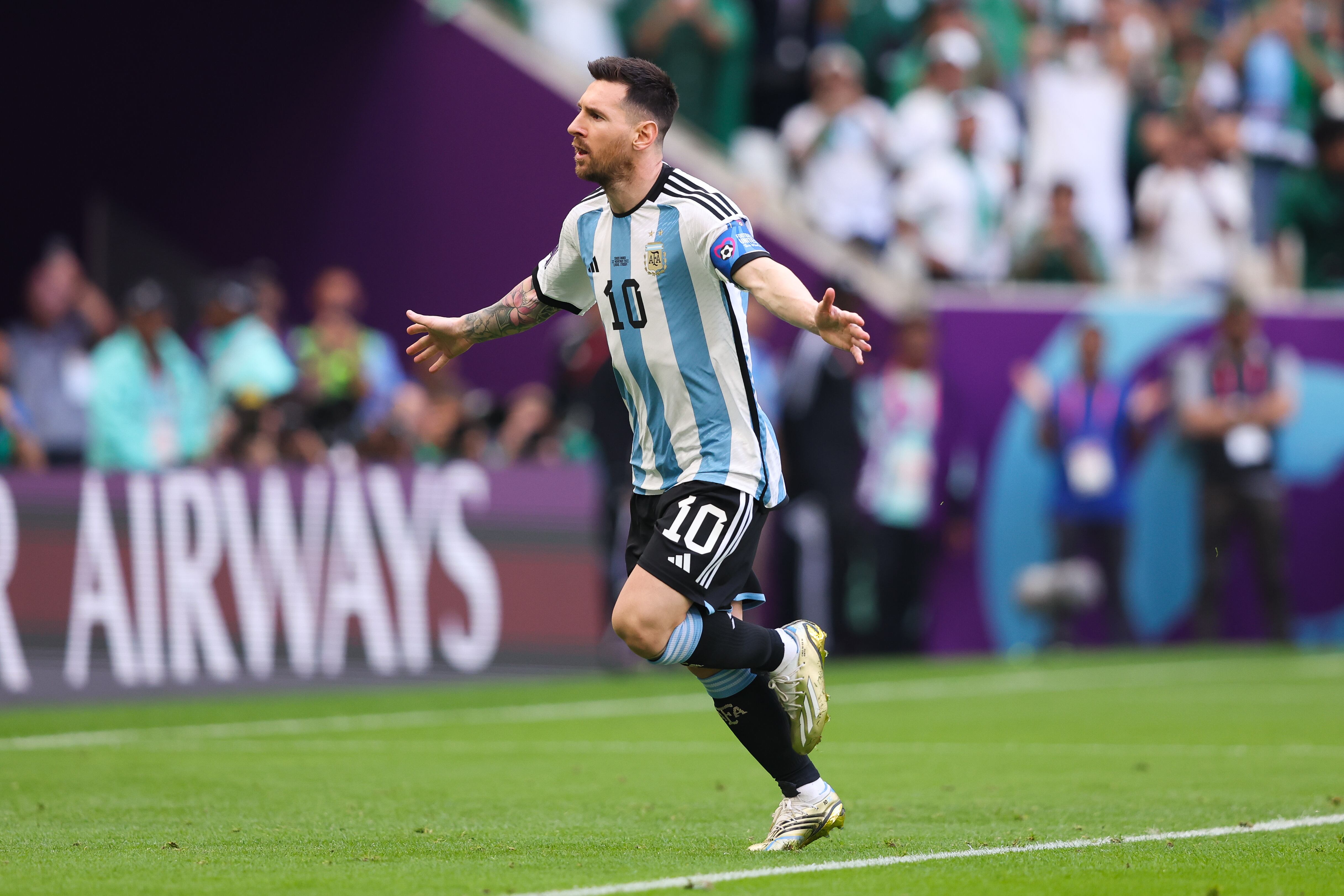 LUSAIL CITY, QATAR - NOVEMBER 22: Lionel Messi of Argentina celebrates after scoring his side's first goal from the penalty spot during the FIFA World Cup Qatar 2022 Group C match between Argentina and Saudi Arabia at Lusail Stadium on November 22, 2022 in Lusail City, Qatar. (Photo by Alex Livesey - Danehouse/Getty Images)