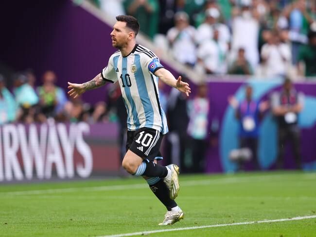 LUSAIL CITY, QATAR - NOVEMBER 22: Lionel Messi of Argentina celebrates after scoring his side&#039;s first goal from the penalty spot during the FIFA World Cup Qatar 2022 Group C match between Argentina and Saudi Arabia at Lusail Stadium on November 22, 2022 in Lusail City, Qatar. (Photo by Alex Livesey - Danehouse/Getty Images)