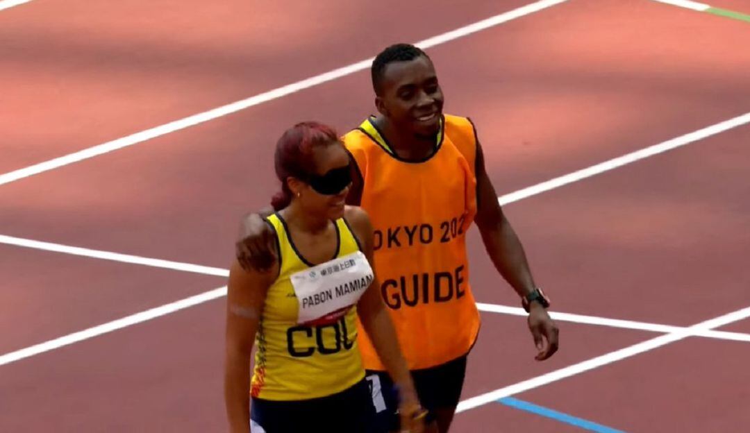 Angie Pabón y su guía Luis Arizala en Tokio 2020