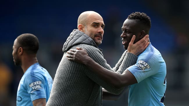 Pep Guardiola y Benjamin Mendy