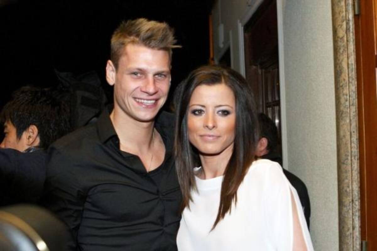 El defensa alemán Lukasz Piszczek y su esposa Ewa.