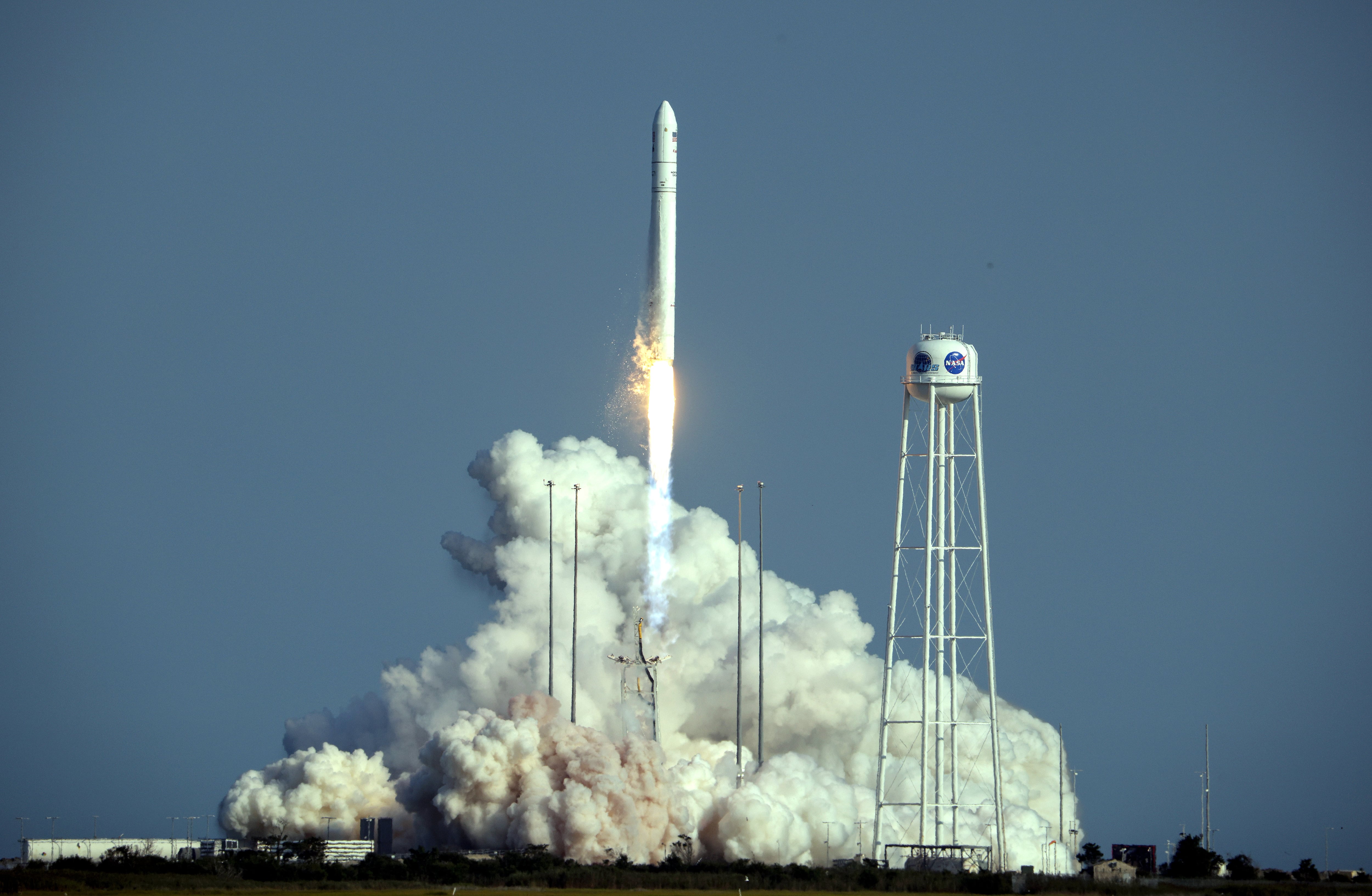 WALLOPS ISLAND, VIRGINIA - AUGUST 10: A Northrop Grumman Antares rocket, carrying the Cygnus cargo spacecraft, launches from Pad-0A at NASA's Wallops Flight Facility on August 10, 2021 in Wallops Island, Virginia. The unmanned Cygnus cargo spacecraft will deliver more than 8,200 pounds of research equipment, crew supplies and hardware to the International Space Station. (Photo by Kevin Dietsch/Getty Images)