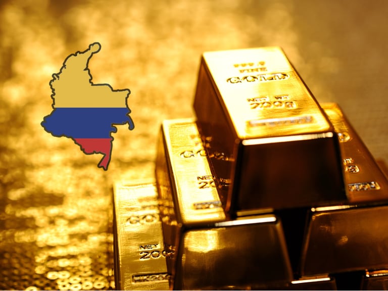 Lingotes de oro y al lado el mapa de Colombia con los colores de la bandera (Fotos vía Getty Images)