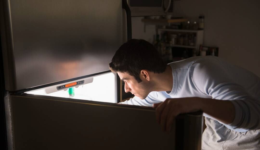 Comer en la noche - Getty Images 