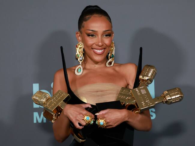 LAS VEGAS, NEVADA - MAY 15: Doja Cat poses backstage with awards for the Top R&B Album, Top R&B Female Artist, Top R&B Artist and Top Viral Song during the 2022 Billboard Music Awards at MGM Grand Garden Arena on May 15, 2022 in Las Vegas, Nevada. (Photo by Frazer Harrison/Getty Images for MRC)