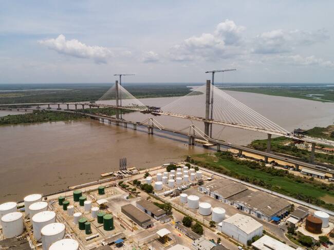 Para la época de la construcción del puente, este era tan importante que se realizó una reunión en agosto de 1969 entre la Comisión de Lideres de Barranquilla, el Presidente Carlos Lleras y los ingenieros del proyecto del puente, en Bogotá.