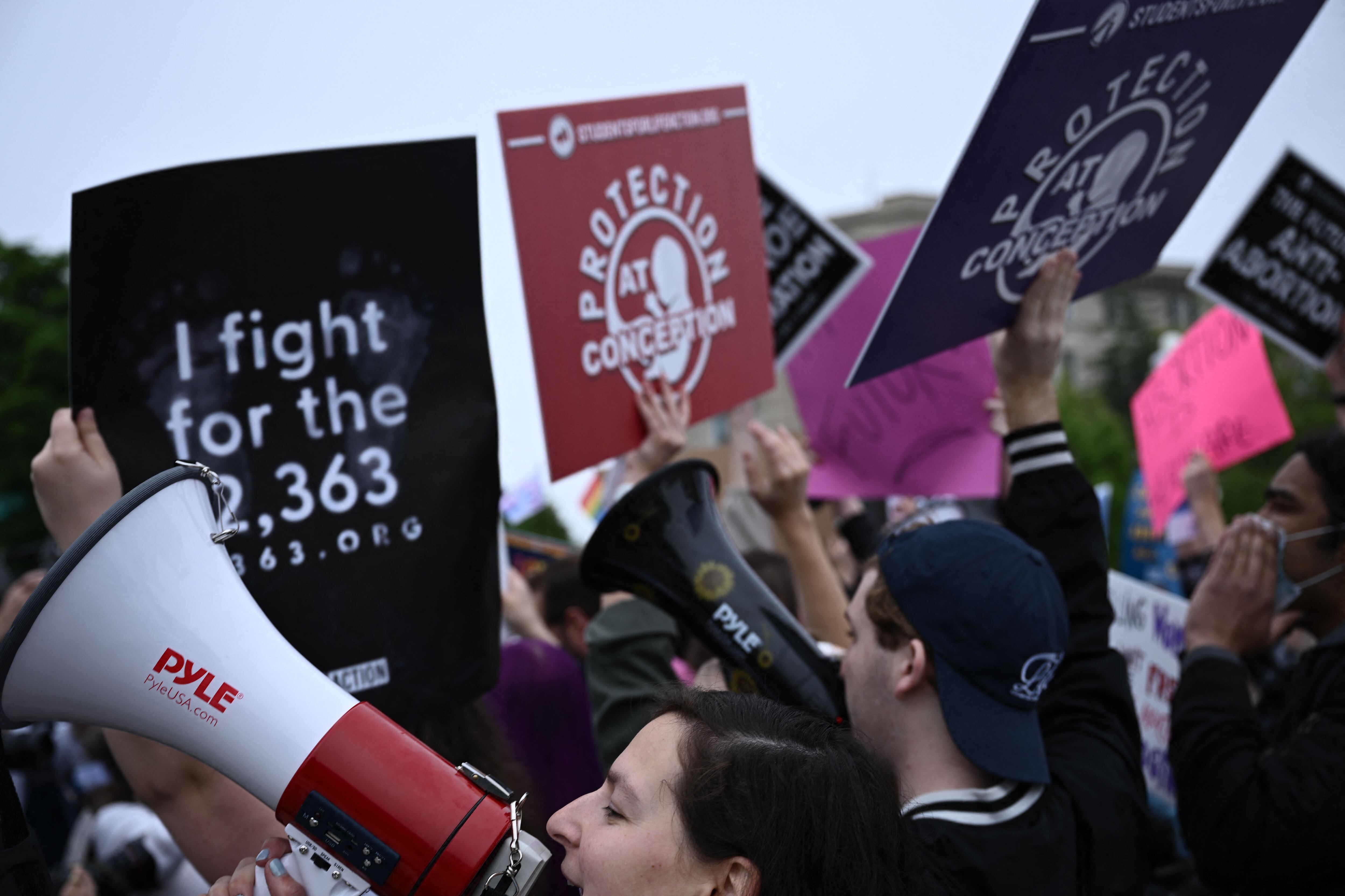 Pro-life demonstrators gather in front of the US Supreme Court in Washington, DC, on May 3, 2022. - The Supreme Court is poised to strike down the right to abortion in the US, according to a leaked draft of a majority opinion that would shred nearly 50 years of constitutional protections. The draft, obtained by Politico, was written by Justice Samuel Alito, and has been circulated inside the conservative-dominated court, the news outlet reported. Politico stressed that the document it obtained is a draft and opinions could change. The court is expected to issue a decision by June. The draft opinion calls the landmark 1973 Roe v Wade decision "egregiously wrong from the start." (Photo by Brendan SMIALOWSKI / AFP) (Photo by BRENDAN SMIALOWSKI/AFP via Getty Images)