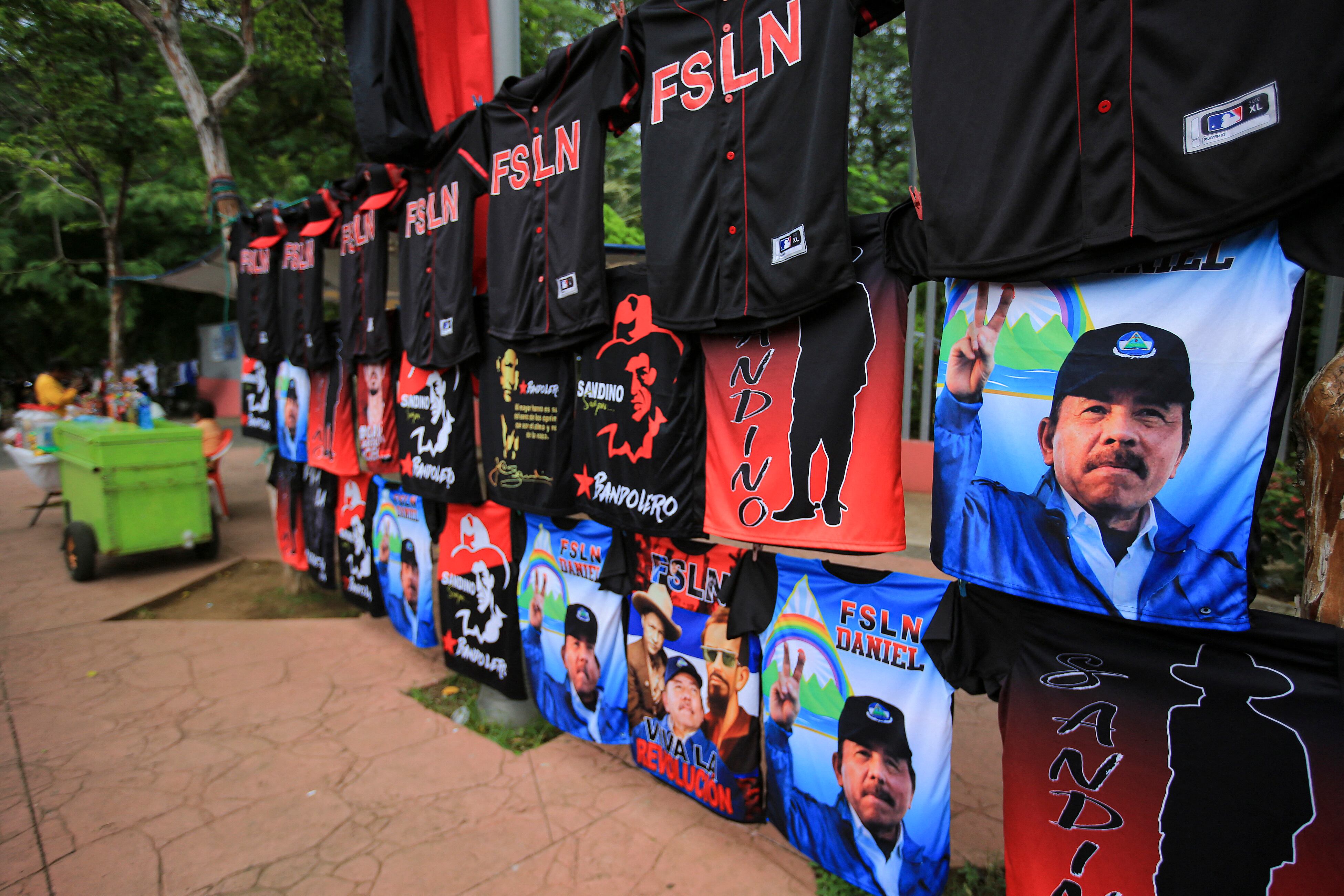 T-shirts depicting Nicaraguan President Daniel Ortega are sold in a street on the eve of the 44th anniversary of the Nicaraguan Revolution in Managua, on July 17, 2023. (Photo by OSWALDO RIVAS / AFP) (Photo by OSWALDO RIVAS/AFP via Getty Images)