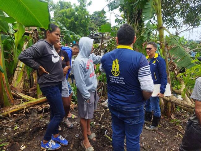 Personas damnificadas en el barrio Nueva Colombia