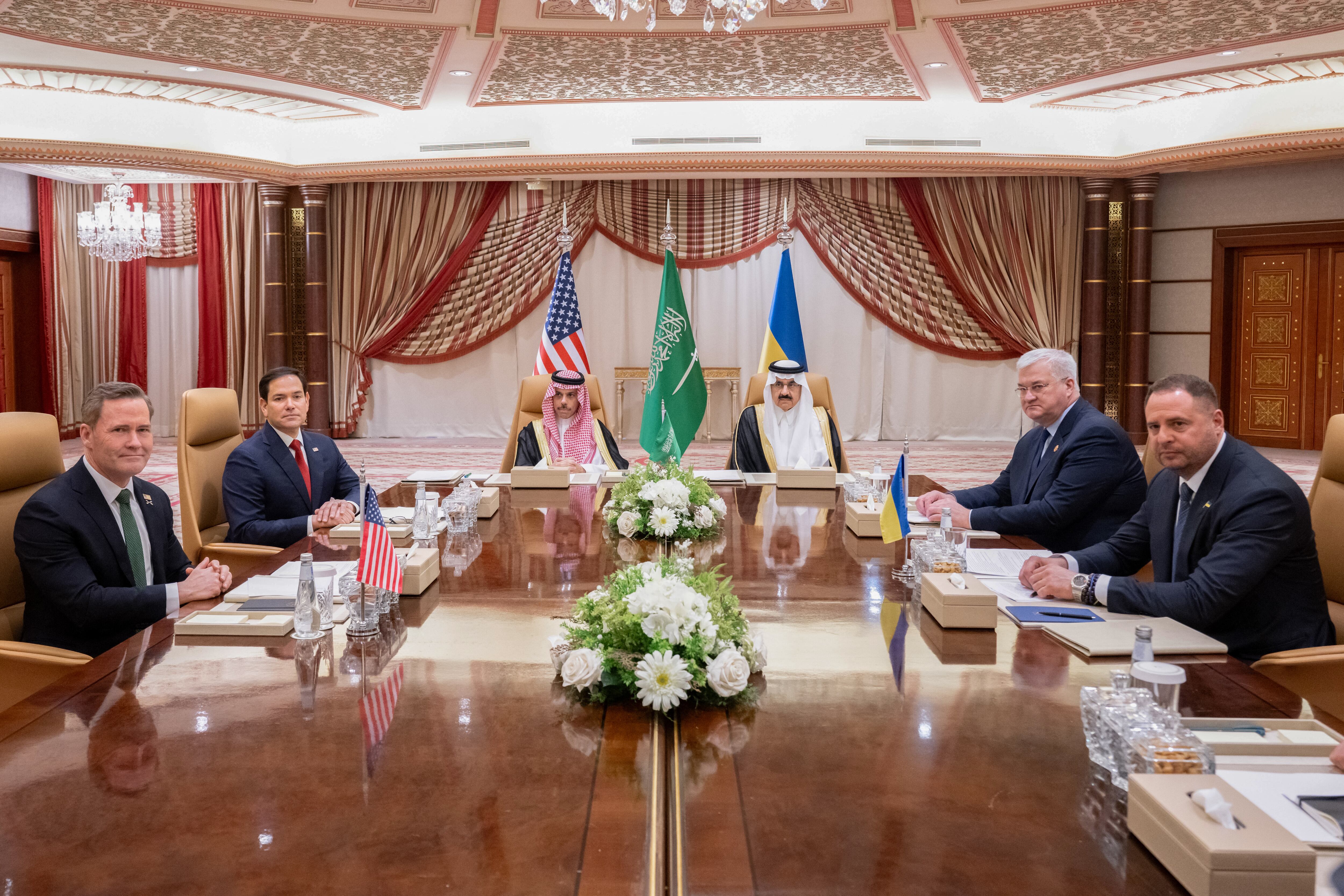 US Secretary of State Marco Rubio (2nd L), US National Security Advisor Mike Waltz (L), Ukrainian Foreign Minister Andrii Sybiha (3rd R), Ukrainian Head of Presidential Office Andriy Yermak (2nd R), and Ukrainian Minister of Defense Rustem Umerovto (R) hold a meeting in Jeddah in the presence of Saudi Foreign Minister Faisal bin Farhan (3L) and National Security Advisor Mosaad bin Mohammad al-Aiban (C) on March 11, 2025. In the Saudi-hosted talks, Ukraine is to present the US with a plan for a partial ceasefire with Russia, hoping to restore support from its key benefactor, which under President Donald Trump has demanded concessions to end the three-year war. (Photo by SAUL LOEB / POOL / AFP) (Photo by SAUL LOEB/POOL/AFP via Getty Images)          