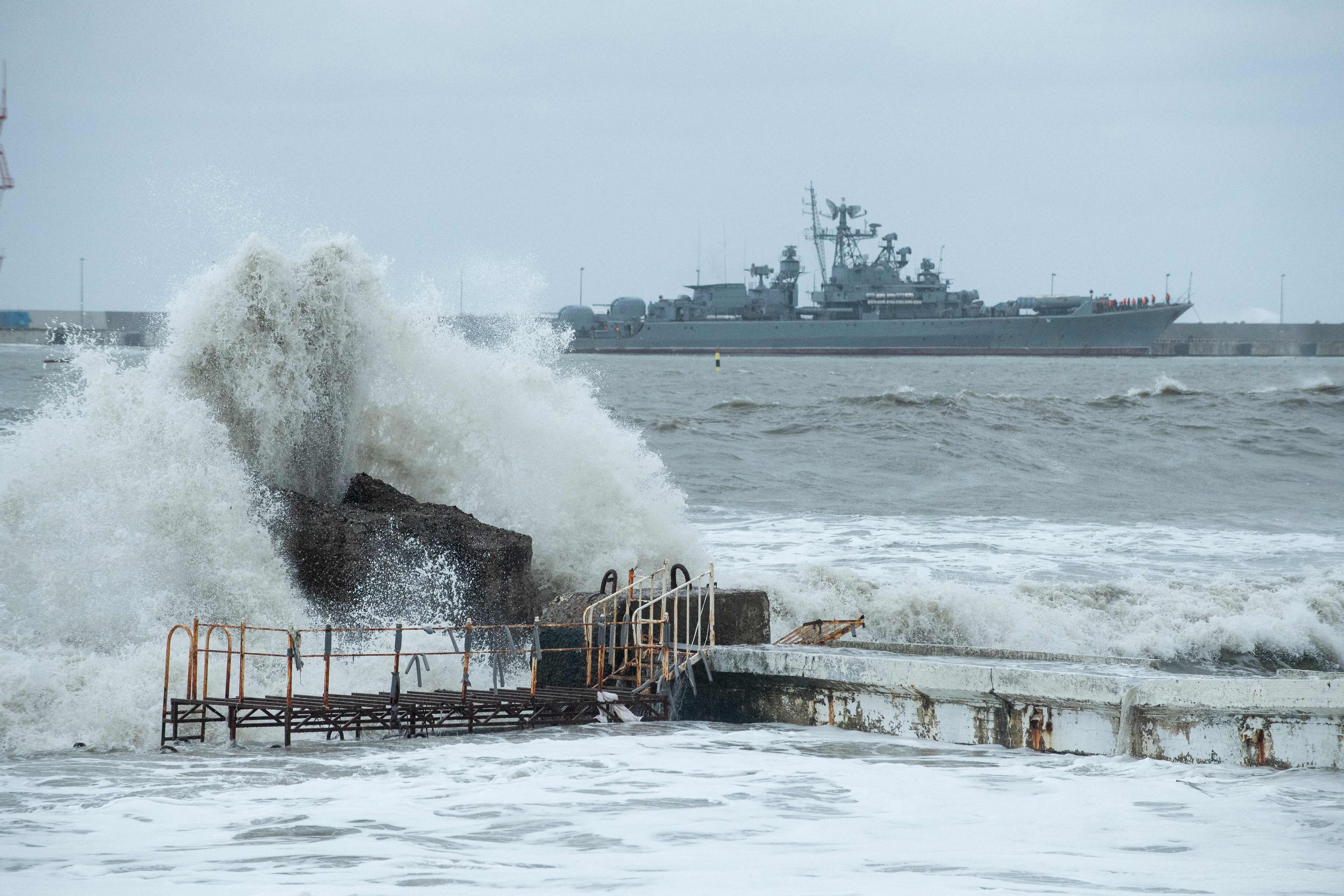 A warship is seen docked in the port of the Black Sea resort city of Sochi during a storm on November 27, 2023. (Photo by Mikhail Mordasov / AFP) (Photo by MIKHAIL MORDASOV/AFP via Getty Images)