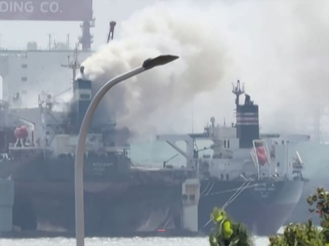 This screengrab from video taken on September 10, 2026 and provided by Qingdao WoLin Packaging shows smoke rising from a cargo ship at a port in Qingdao in eastern China. A fire erupted September 10 on a foreign-flagged cargo ship docked in an Chinese port, leaving at least 20 people dead and five missing, state media said. (Photo by Qingdao WoLin Packaging / AFP) / RESTRICTED TO EDITORIAL USE � MANDATORY CREDIT � AFP PHOTO / Qingdao WoLin Packaging � - NO MARKETING NO ADVERTISING CAMPAIGNS � DISTRIBUTED AS A SERVICE TO CLIENTS - NO ARCHIVE
