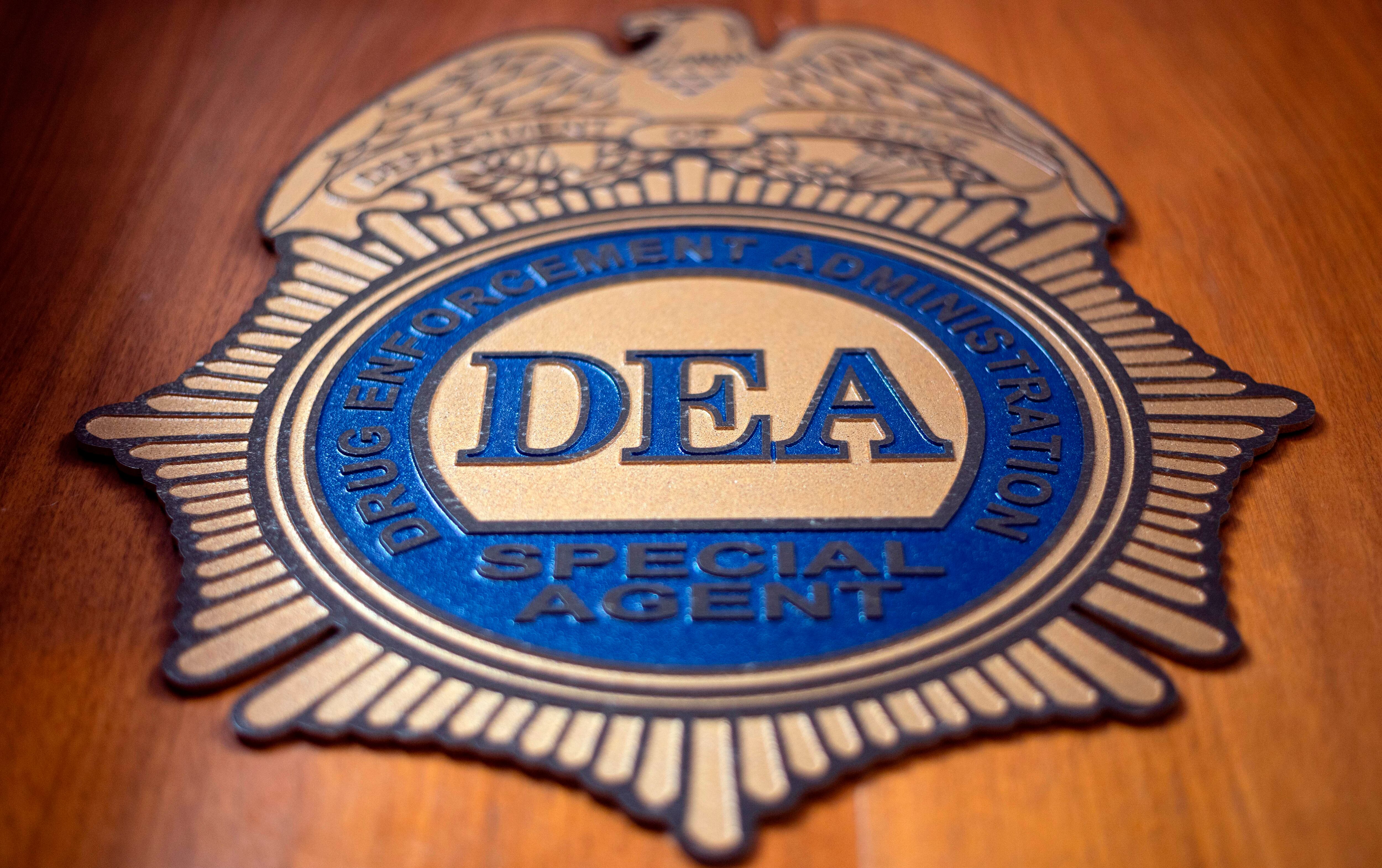 A logo reading DEA Special Agent is pictured in the Office of the US Drug Enforcement Administration (DEA) on  May 29, 2019 in New York City. (Photo by Johannes EISELE / AFP) (Photo by JOHANNES EISELE/AFP via Getty Images)