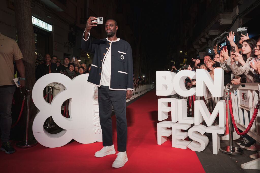 BARCELONA, SPAIN - APRIL 26: Actor Omar Sy records video of his fans during the "Padre y soldado" Premiere at the BCN Film Festival 2023 at Cines Verdi on April 26, 2023 in Barcelona, Spain. (Photo by Mario Wurzburger/Getty Images)