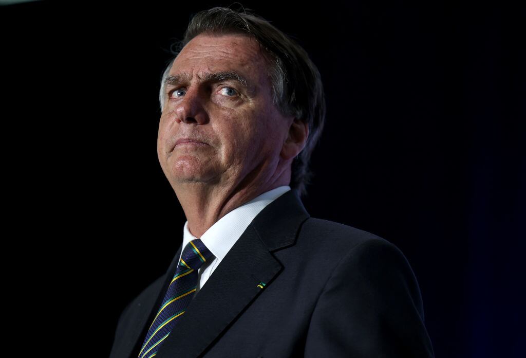 DORAL, FLORIDA - FEBRUARY 03:  Far-right former Brazilian President Jair Bolsonaro speaks during the Turning Point USA event at the Trump National Doral Miami resort on February 03, 2023 in Doral, Florida. Bolsonaro has been staying in Orlando since leaving Brazil two days before the inauguration of President Luiz Inácio Lula da Silva. (Photo by Joe Raedle/Getty Images)