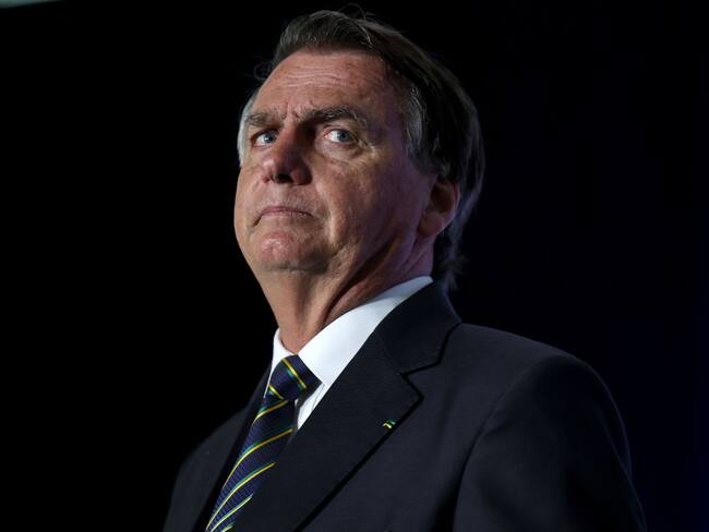 DORAL, FLORIDA - FEBRUARY 03: Far-right former Brazilian President Jair Bolsonaro speaks during the Turning Point USA event at the Trump National Doral Miami resort on February 03, 2023 in Doral, Florida. Bolsonaro has been staying in Orlando since leaving Brazil two days before the inauguration of President Luiz Inácio Lula da Silva. (Photo by Joe Raedle/Getty Images)