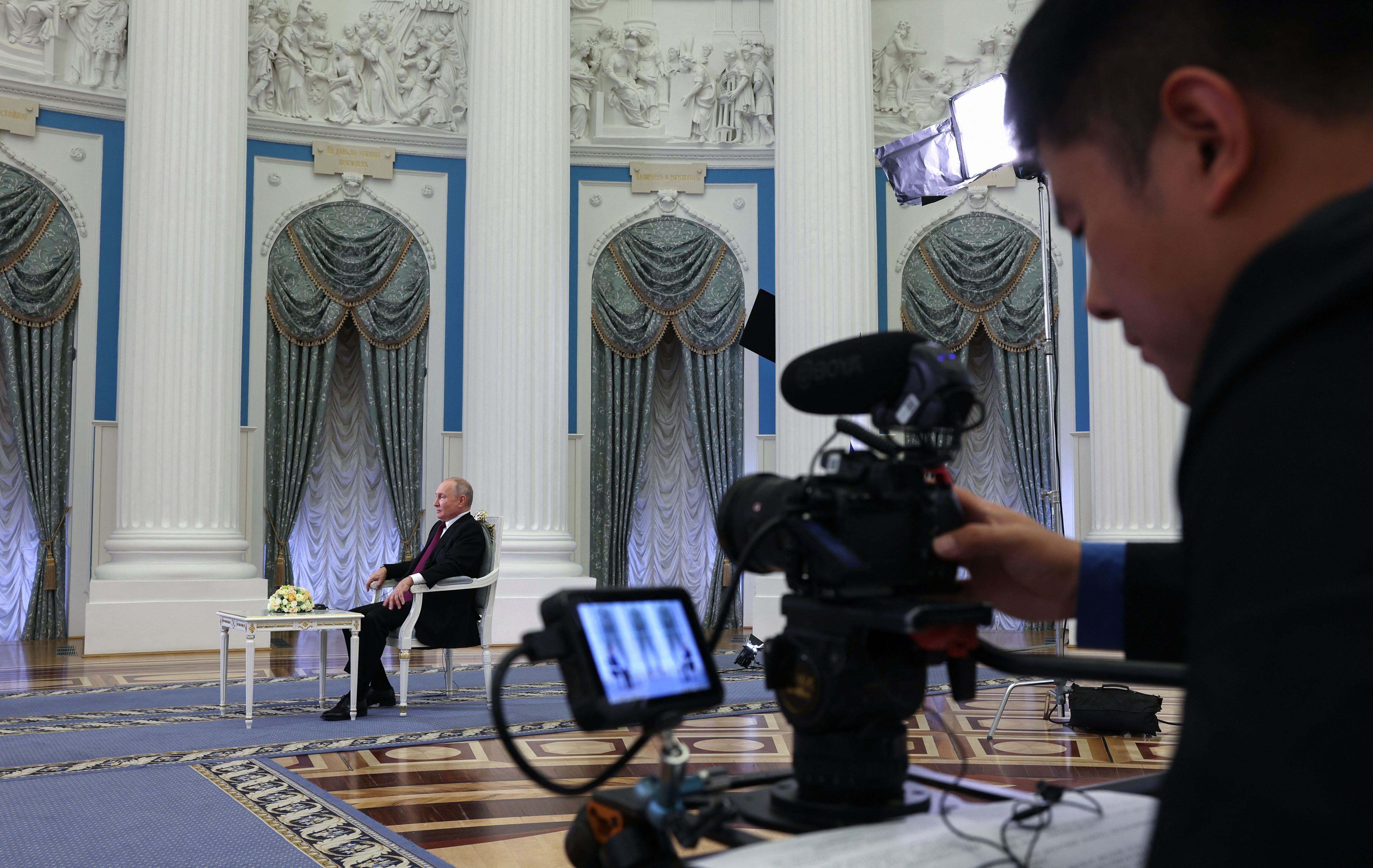 This pool photograph distributed by Russian state owned agency Sputnik shows Russia's President Vladimir Putin giving an interview to China Media Group at the Kremlin in Moscow on October 16, 2023. (Photo by Sergei BOBYLYOV / POOL / AFP) (Photo by SERGEI BOBYLYOV/POOL/AFP via Getty Images)