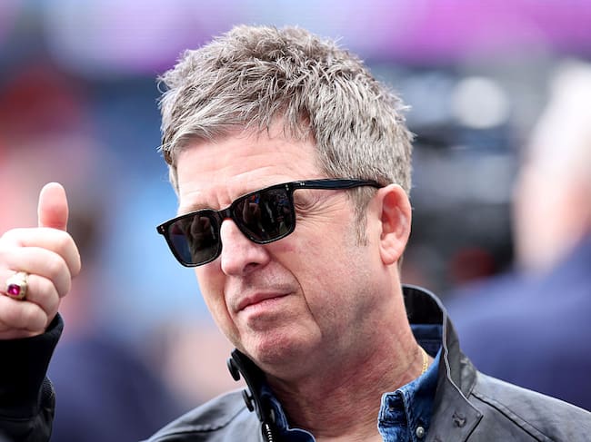 MANCHESTER, ENGLAND - APRIL 19: Musician, singer and songwriter Noel Gallagher gives a thumbs up before the Premier League match between Manchester City and Arsenal at Etihad Stadium on April 19, 2026 in Manchester, England. (Photo by Copa/Getty Images)