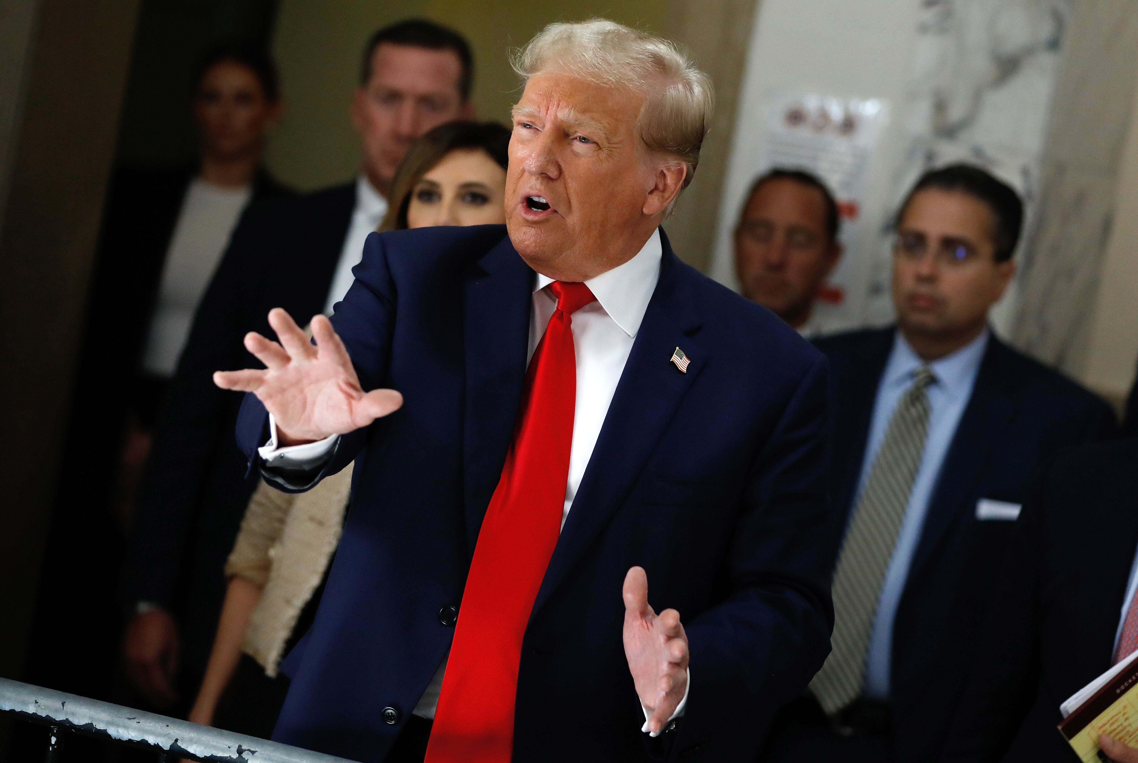 New York (United States), 04/10/2023.- Former US President Donald J. Trump speaks to the media during a lunch break on the third day of his civil fraud trial in New York, New York, USA, 04 October 2023. Trump, his adult sons and the Trump family business are facing a lawsuit by the State of New York accusing them of inflating the value of assets to get favorable loans from banks. (Nueva York) EFE/EPA/PETER FOLEY