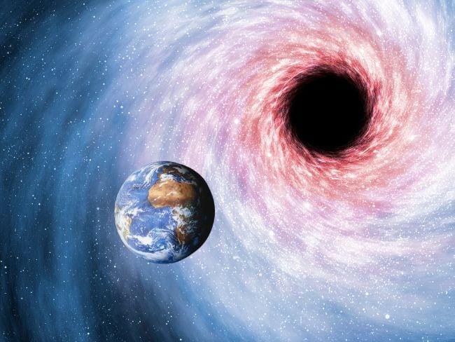 Agujero negro y la tierra