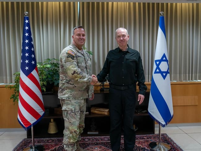 TEL AVIV, ISRAEL - AUGUST 05: (----EDITORIAL USE ONLY - MANDATORY CREDIT - 'ARIEL HERMONI / IMOD / HANDOUT' - NO MARKETING NO ADVERTISING CAMPAIGNS - DISTRIBUTED AS A SERVICE TO CLIENTS----) Israeli Defense Minister Yoav Gallant (R) and Commander of United States Central Command (CENTCOM) Michael Erik Kurilla (L) shakes hands as they meet in Tel Aviv, Israel on August 5, 2024. (Photo by Ariel Hermoni (IMoD) / Handout/Anadolu via Getty Images)